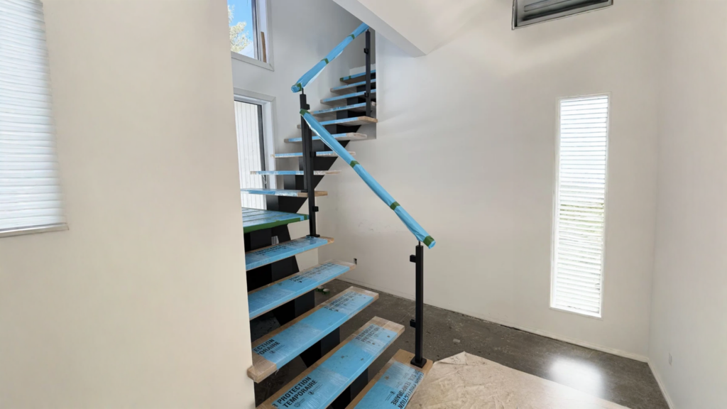 Winder staircase to Central Stringer of steel and railing of metal