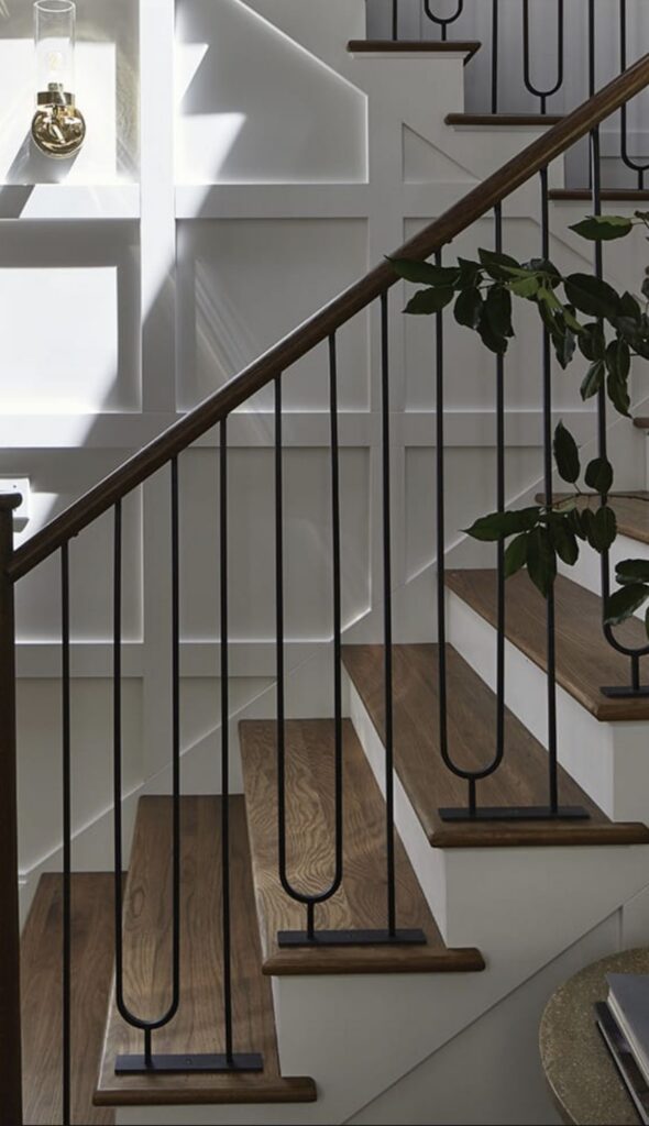 stair railing metal shaped with wood handrail